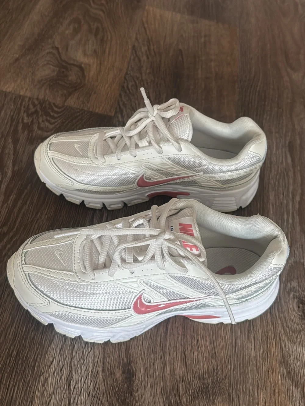 Nike Women’s White Sneakers with Pink Swoosh